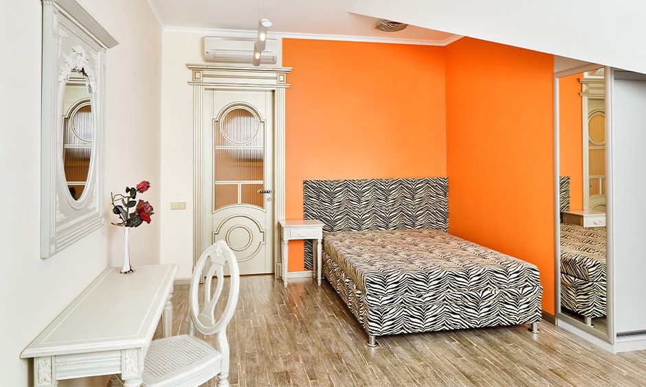 white and orange two colour combination for bedroom walls