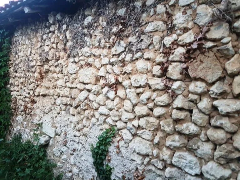 bungaroosh and its repairs 11 Old bungaroosh wall of rough flint, pebbles and broken brick set in lime mortar
